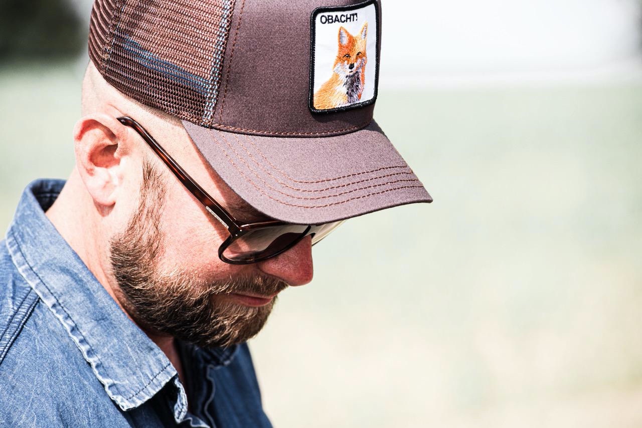 SERVUS - Trucker Cap mit Motto-Patch und Hirsch-Stickerei multi